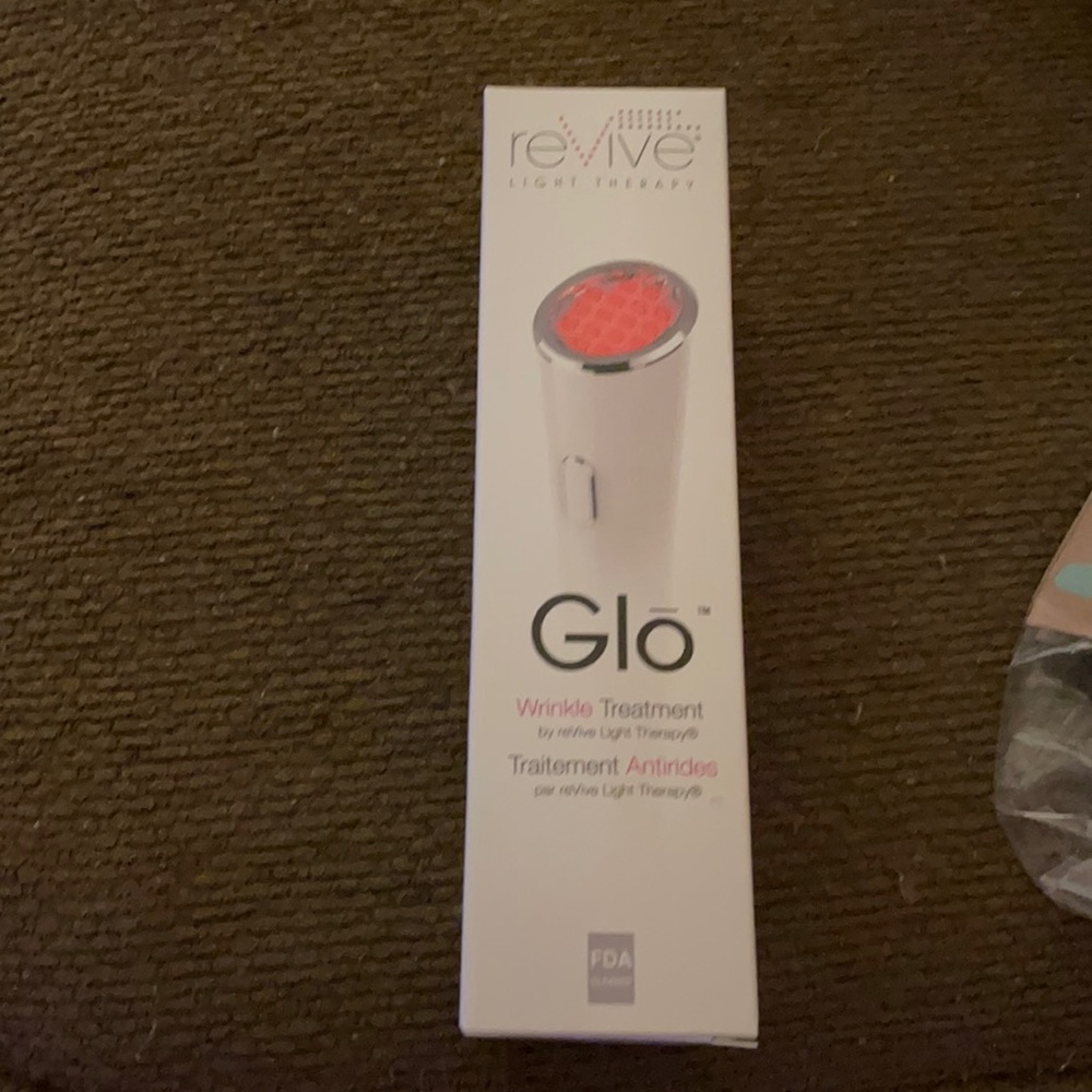 New in box Glo light.  Never used.